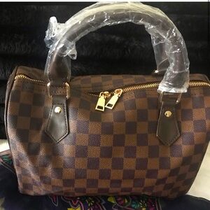 Woman’s Brand New Brown Checkered Handbag/Crossbody Strap( Still in Plastic)
